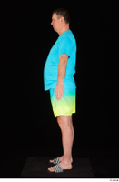 Spencer blue t shirt blue yellow shorts dressed slides standing whole body 0011.jpg